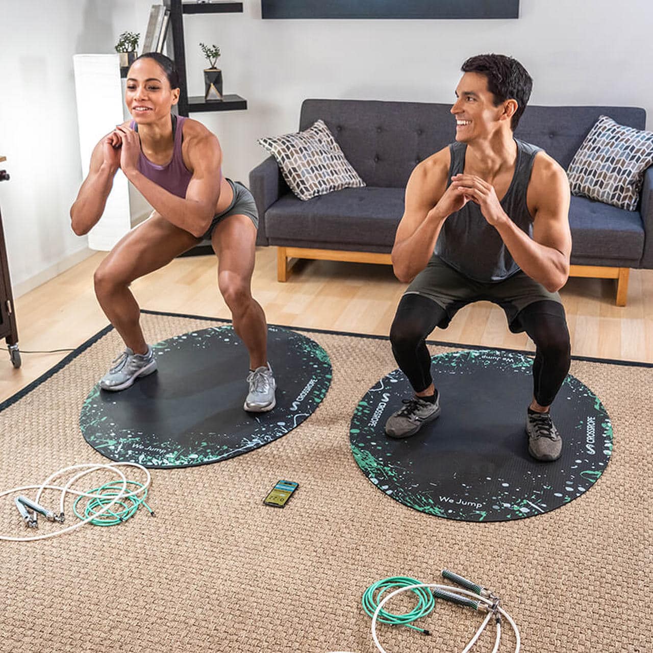 People working out on the Crossrope Jump Rope Mat